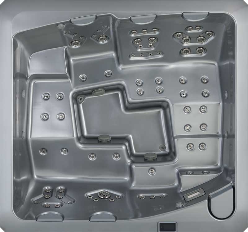 Set ovenfra af en grå USSPA spa-pool med ergonomiske siddepladser og flere jetzoner
